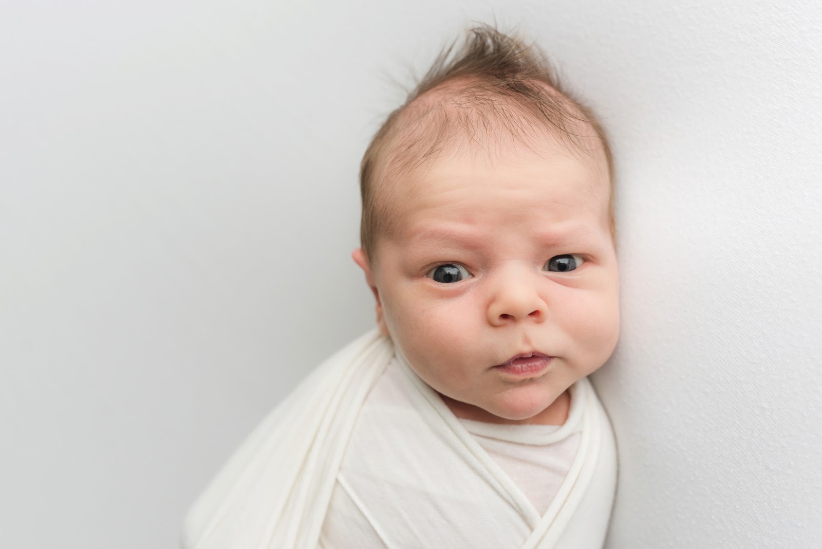Newborn Photography in Orange County Baby says hello